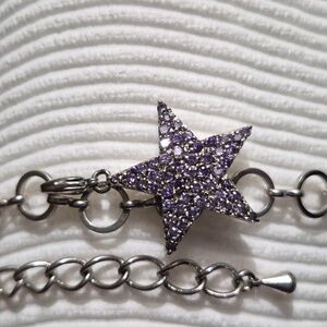 Y2K-style star charm bracelet with pink or purple rhinestones